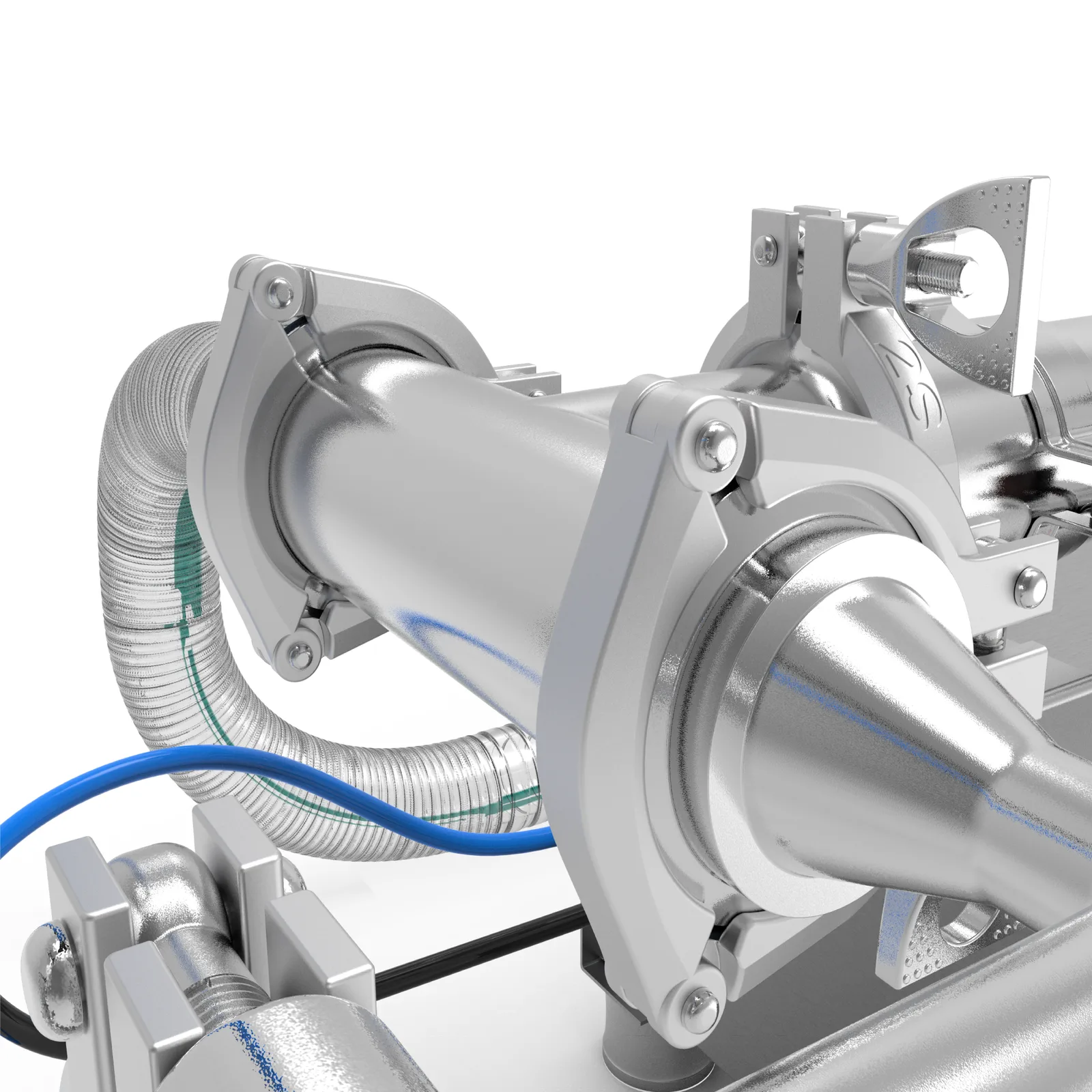 Primer plano de las abrazaderas tri-clamp y la manguera de entrada principal del llenador de pistón JORES TECHNOLOGIES®