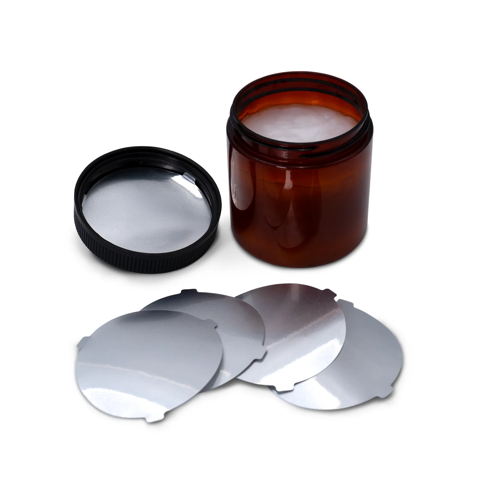 Posición del sello de inducción con pestañas dentro de la tapa antes de ser sellado